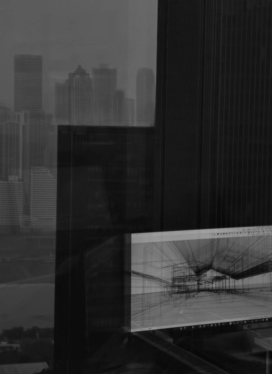 窗外城市楼群与屏幕上的建筑草图
